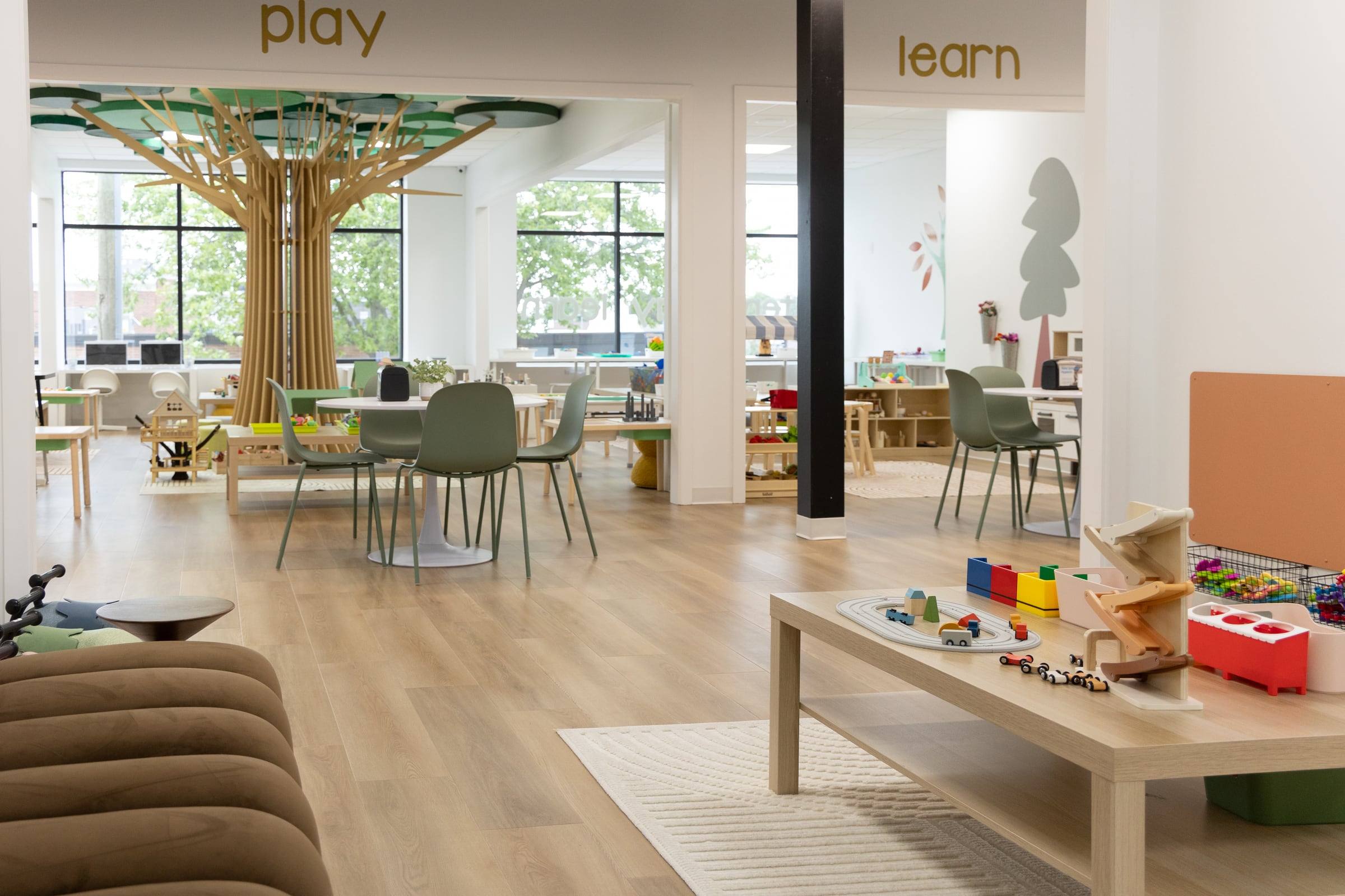 The café tables between the play and learn rooms